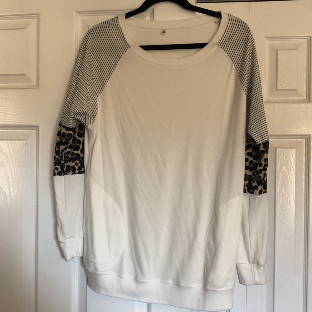 Women’s long sleeve boutique top.